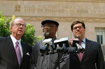Glynn Simmons with members of his legal team